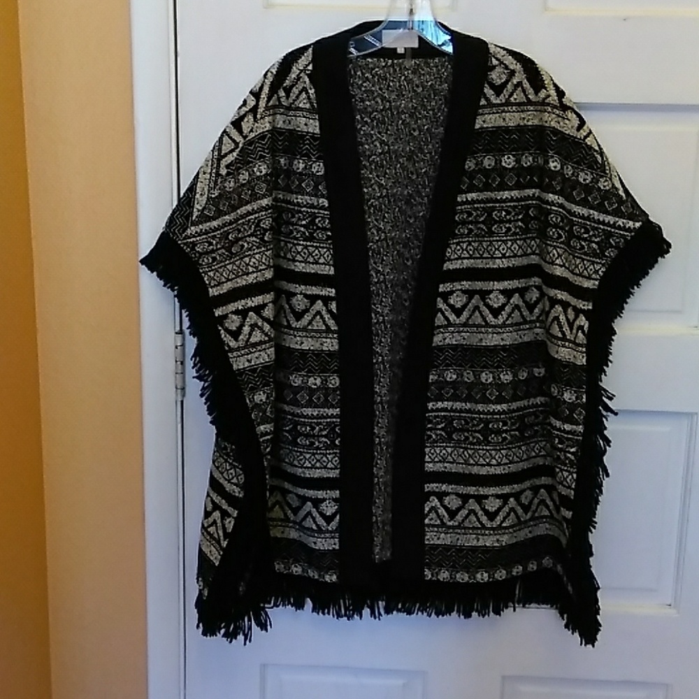 1 state. Poncho cardigan size large Aztec design